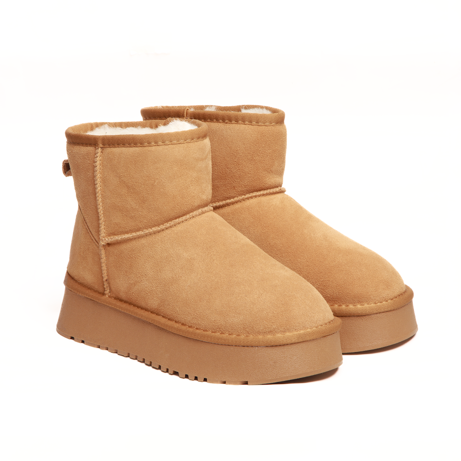 Угги бежевого кольору середньої посадки